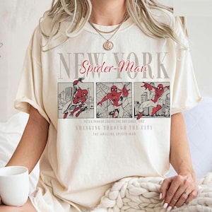 May include: A set of three ceramic mugs with a speckled, matte finish. The mugs are in shades of cream, light gray, and dark gray. Each mug has a simple, minimalist design, perfect for coffee or tea.