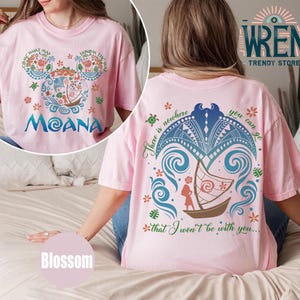 May include: Pink t-shirt with a floral Mickey Mouse design on the front and a Moana quote on the back. The quote reads "There is nowhere you can go that I won't be with you..."