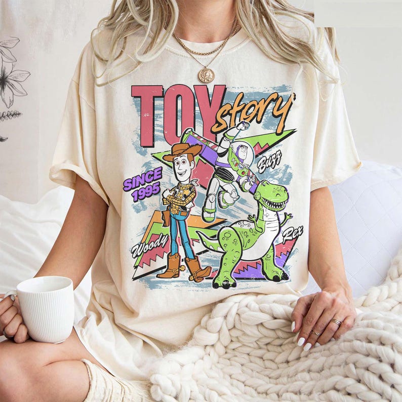 May include: A set of three ceramic mugs with a speckled, matte finish. Each mug features a different color: light blue, cream, and gray. The mugs have a simple, modern design and a comfortable handle.