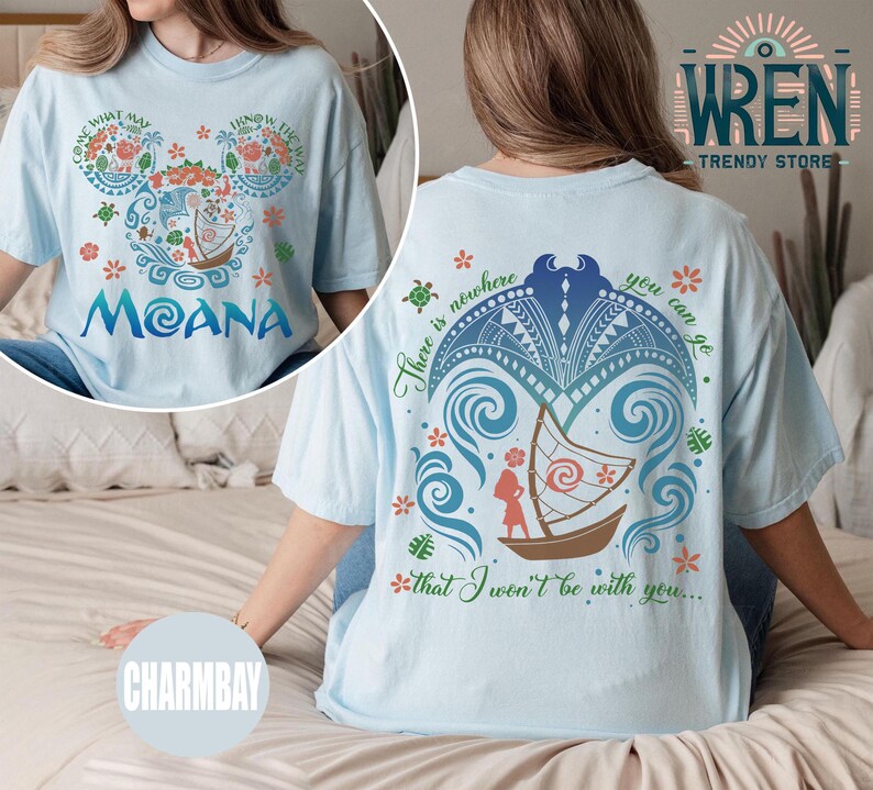 May include: Light blue t-shirt with a graphic print of a cartoon character with the text "Moana" and the phrase "There is nowhere you can go that I won't be with you..." on the back.