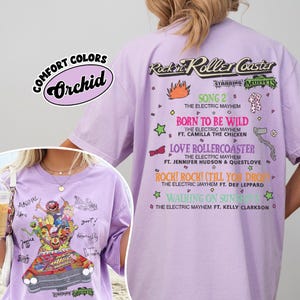 May include: Orchid-coloured t-shirt with a graphic of the Muppets on a roller coaster. The shirt features the text "Rockin' Roller Coaster Starring Muppets" and song titles. Made from Comfort Colors material.