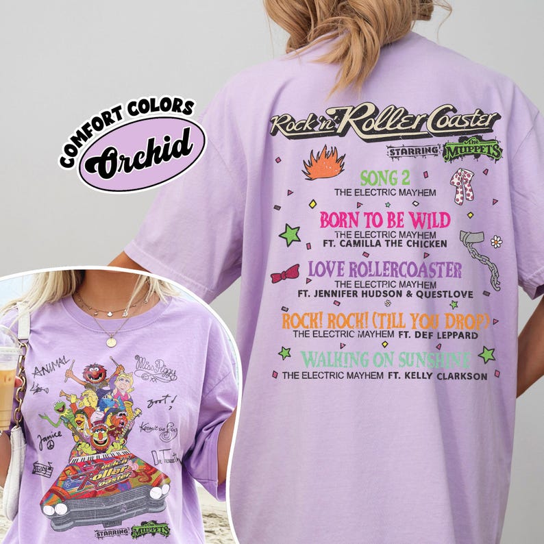 May include: Orchid-coloured t-shirt with a graphic of the Muppets on a roller coaster. The shirt features the text "Rockin' Roller Coaster Starring Muppets" and song titles. Made from Comfort Colors material.