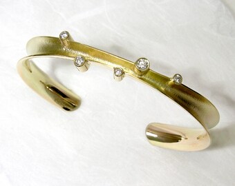 14K Solid Gold Cuff Bracelet, textured set with 5 diamonds.