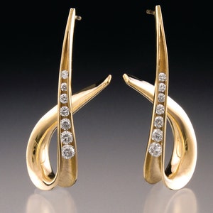14k Gold Diamond Earrings.