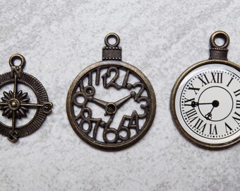Three Steampunk themed clock and flower pendants