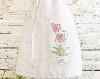 Cafe Apron with  purple pansy floral watercolor print.  One size fits all French linen apron is a unique gift.  Fully machine washable.