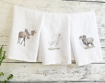 Set of three mountain animal themed French linen tea towels, wildlife prints on dish towel set, moose, mountain goat, bighorn sheep