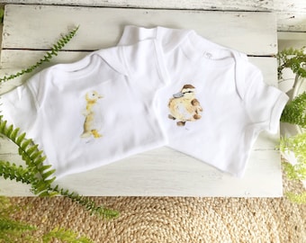 Gender neutral baby outfits with woodland themed art, Canadian artist, 3 sizes, printed in Canada, baby duck watercolor art, unisex
