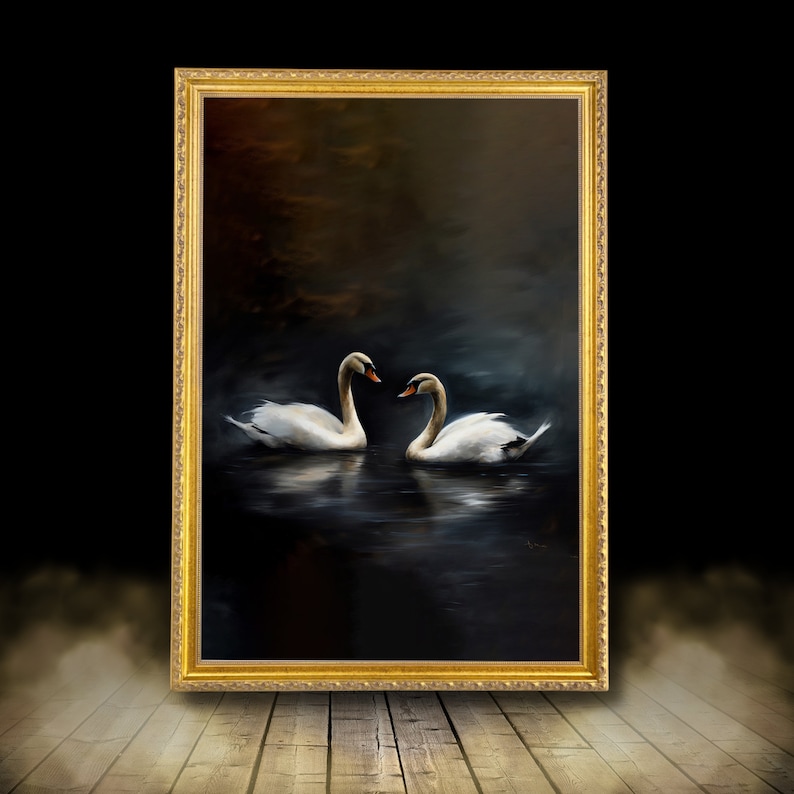 May include: A framed painting depicts two white swans on a dark, reflective body of water. The swans have orange beaks and are set against a moody, dark background. The ornate gold frame adds a classic touch to the artwork.