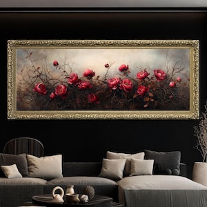 May include: A framed floral painting featuring vibrant red roses and delicate branches against a soft, neutral background. The artwork is encased in an ornate gold frame, adding a touch of elegance. The painting's dimensions are approximately 48 inches wide and 20 inches high.