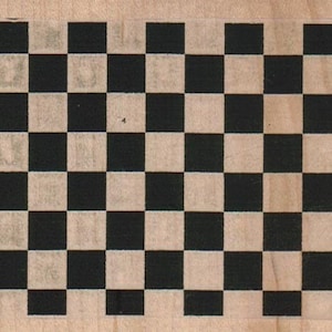 May include: A black and white chequered pattern on a wooden surface.