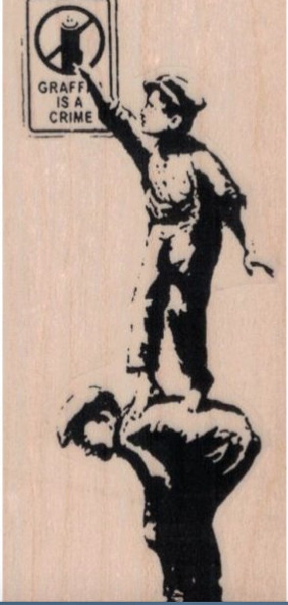 Banksy Rubber Stamp Graffiti is Not A Crime Kids Face