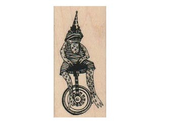timbri in gomma rana su ruote monociclo Steampunk Timbro in legno montato progettato da Mary Vogel Lozinak no 19217