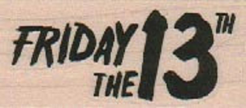 Puede incluir: Dise&ntilde;o gr&aacute;fico en blanco y negro del texto "Viernes 13" con un n&uacute;mero 13 estilizado.