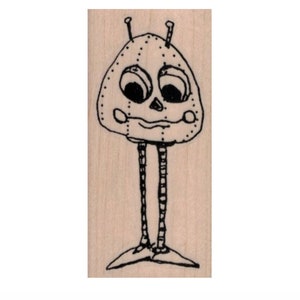 May include: A black and white line drawing of a robot with a round head, two antennas, and long legs. The robot has a friendly expression with large eyes and a small mouth.