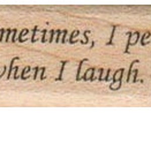 May include: A wooden stamp with the text "Sometimes, I pee when I laugh."