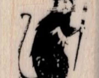 Puede incluir: Ilustración en blanco y negro de una rata con sombrero y bastón.