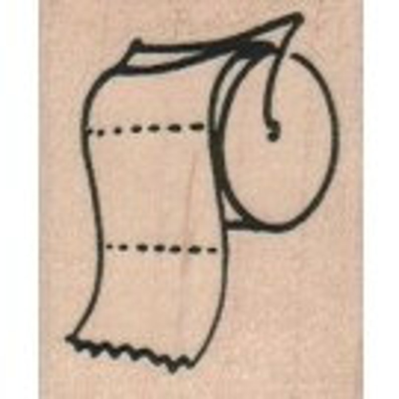 May include: A white toilet paper roll with a black holder. The roll is partially unrolled, showing the white paper with black lines.