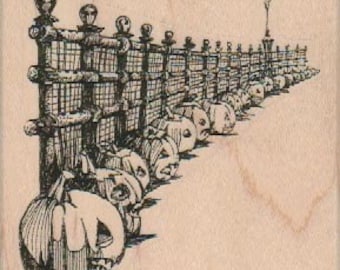 May include: A black and white illustration of a row of carved pumpkins lined up in front of a wooden fence. The pumpkins are all different sizes and shapes, and some have faces carved into them. There is a streetlight at the end of the row of pumpkins.