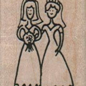 May include: Two brides in white wedding dresses with veils and tiaras, holding a bouquet of flowers.