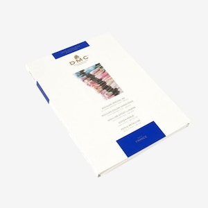 May include: A white booklet with a blue border and the text "D-M-C" in gold lettering. The booklet is titled "Mouline Special 89" and lists "Mouline Color Variations", "Mouline Effet Lumiere", "Coton Perle", and "Perle Metallise". The booklet is made in France.