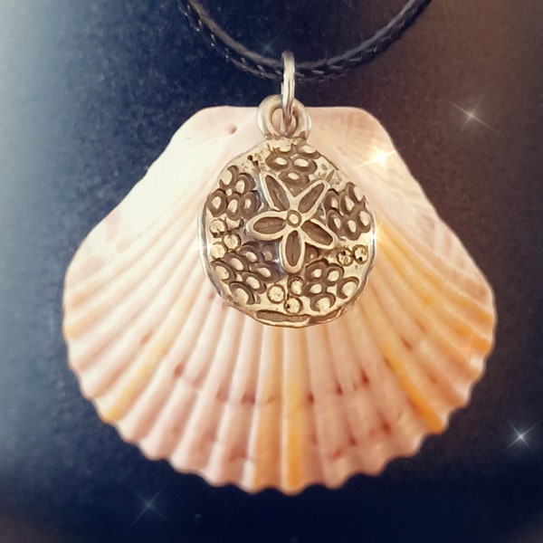 Beautiful Seashell necklace with a Sandollar Charm