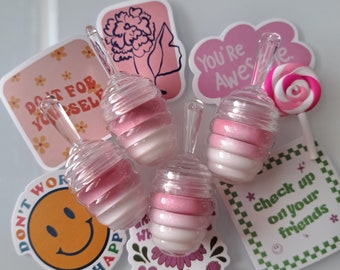 Cute different lip glosses with stickers