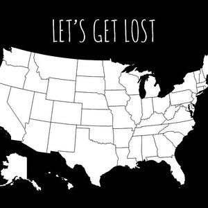 May include: A black and white graphic of the United States map. The map is a simplified outline of the country, with each state clearly delineated. The text "LET'S GET LOST" is written in a whimsical font above the map.