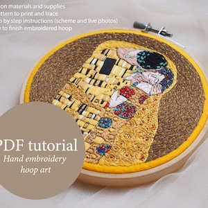 May include: A PDF tutorial for hand embroidery hoop art featuring a close-up of a finished embroidery hoop with a depiction of The Kiss by Gustav Klimt. The tutorial includes tips on materials, a pattern to print and trace, step-by-step instructions, and how to finish the embroidered hoop.