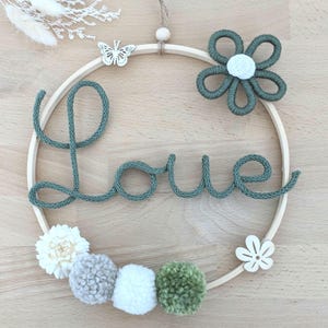 Baby room decoration with knitted name and macrame daisy flower / macrame flower crown with pompoms