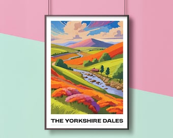 May include: A framed art print of a colorful landscape. The artwork depicts a winding river through rolling hills with vibrant orange, green, and purple hues. The text "THE YORKSHIRE DALES" is at the bottom of the print.