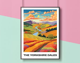 May include: A framed art print featuring a colorful landscape of the Yorkshire Dales. The artwork depicts rolling hills, a winding river, and a vibrant sky with the text "THE YORKSHIRE DALES" at the bottom.