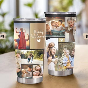 Puede incluir: Vaso de viaje de acero inoxidable con un collage de fotos familiares. La parte delantera presenta el texto "Daddy, We love you" y un coraz&oacute;n. El vaso tiene una tapa negra y una base plateada. Las fotos muestran momentos familiares.