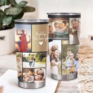 Puede incluir: Vaso de acero inoxidable con un collage de fotos familiares. La parte delantera del vaso tiene el texto "Daddy, We love you" con un coraz&oacute;n. El vaso tiene una tapa negra y una base plateada. El vaso mide aproximadamente 15 cm de alto.