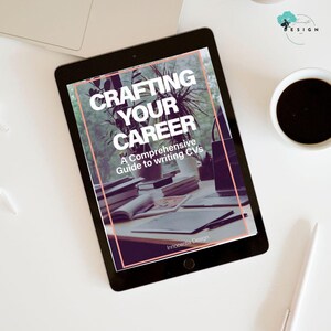 May include: A digital tablet displaying a cover image for a guide on crafting your career. The cover features a photo of a desk with a laptop, books, and a plant. The text on the cover reads "Crafting Your Career: A Comprehensive Guide to Writing CVs" and "Innocentia Design".