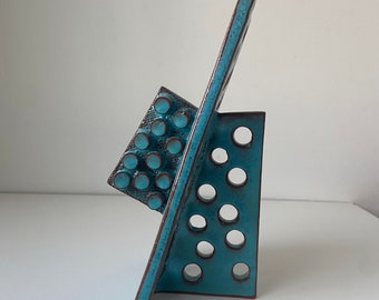 Bright blue geometric ceramic sculpture. Small #1