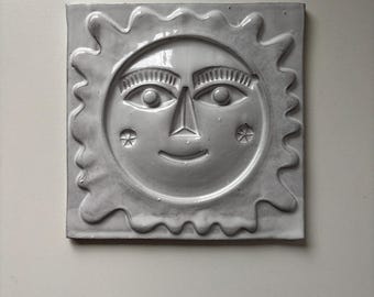 Carrelage en céramique soleil souriant