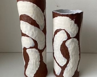 Terra cotta coiled vessel vase with white slip decoration