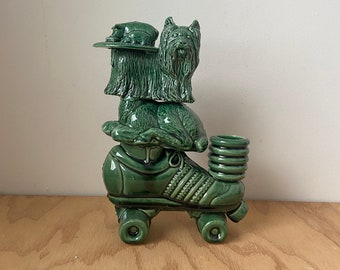 Green Ceramic sculptural candleholder with pig, dog, deer, and roller skate