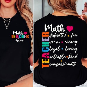 May include: Black t-shirt with the words "Math Teacher" in colorful text. The front of the shirt has the words "Math Teacher Name" and a pink heart. The back of the shirt has a list of words like "dedicated", "fun", and "caring".