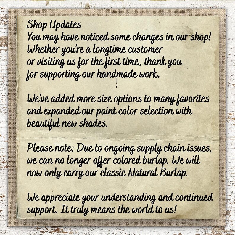 a handwritten message on a piece of paper, which appears to be a shop update notice for a business. The message is written in a casual, handwritten style and includes information about changes in the shop and the availability of new paint color options.