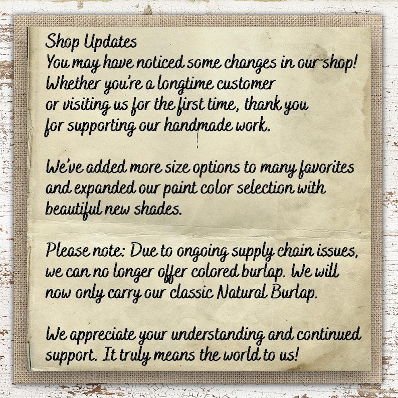 a handwritten message on a piece of paper, which appears to be a shop update notice for a business. The message is written in a casual, handwritten style and includes information about changes in the shop and the availability of new paint color options.