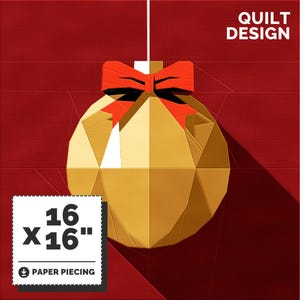 May include: A paper piecing quilt design of a gold Christmas ornament with a red bow. The design is 16 inches by 16 inches.