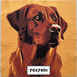 May include: A fabric quilt block featuring a geometric, pieced portrait of a brown dog against a solid mustard yellow background. The dog is rendered in shades of dark brown, tan, and black. A white rectangular label displays the text 70x70in.