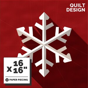 Op de afbeelding: Een wit sneeuwvlok quiltontwerp op een rode achtergrond. Het ontwerp is 16 inch bij 16 inch en is gemaakt met behulp van papierpatchwork.