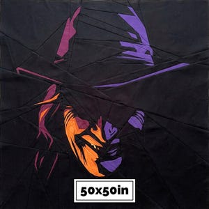 May include: A square fabric quilt block featuring a geometric, pieced design of a person wearing a wide-brimmed hat. The image uses black, purple, and orange fabric segments. A white label at the bottom displays the text 50x50in.