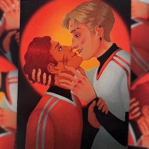 May include: Illustration of two people in a tender embrace, set against a vibrant red backdrop. One person wears a white and red uniform, while the other is in a red outfit. The artwork has a warm color palette and a romantic theme. The artist's initials "NO RA" are in the top left corner.