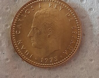 1 peseta de 1975 acuñada en 1976 con un error en la letra E
