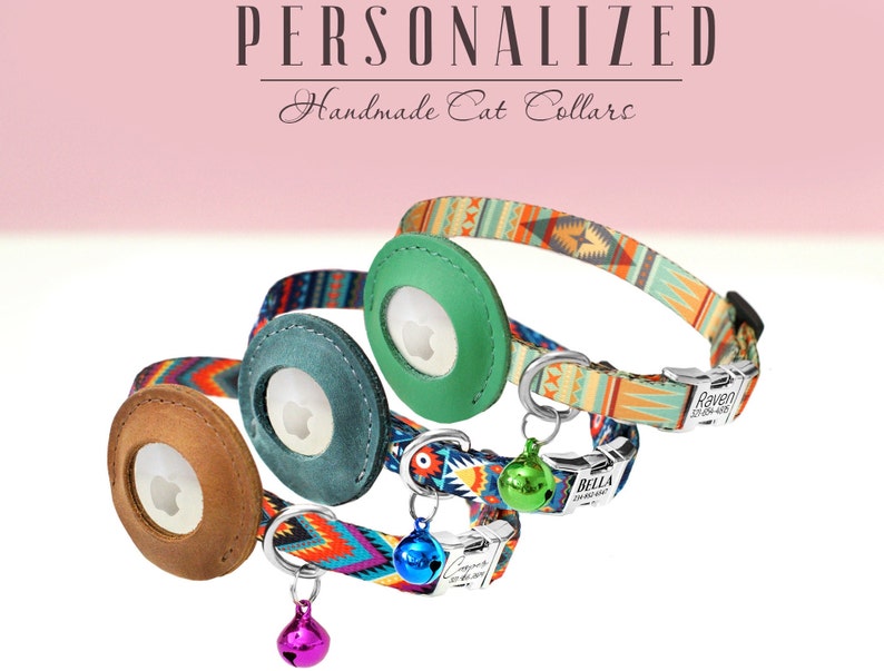 May include: Three personalized cat collars with colorful patterned fabric and leather name tags. The collars feature a breakaway buckle and a bell. The name tags are personalized with the names "Raven", "Bella", and "Jasper".