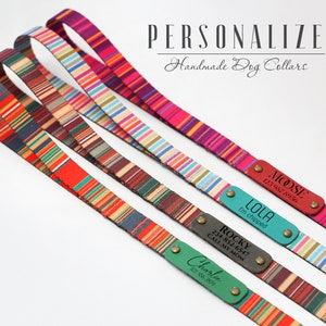 May include: Four colourful striped dog collars with personalised leather tags. The tags have names and phone numbers.